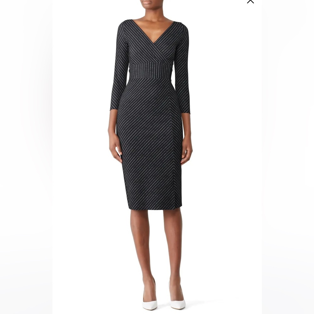 Gorgeous, designer bodycon style dress. The fabric is amazing!! Worn 1x